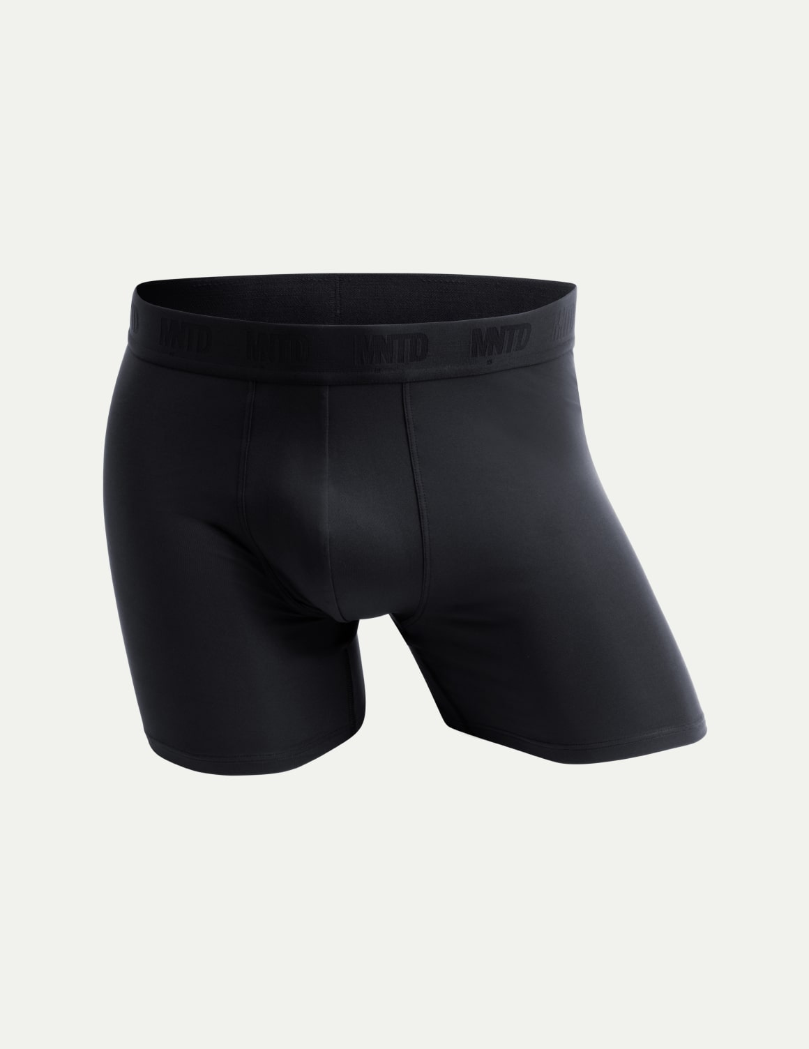 Black boxer briefs on a light gray background